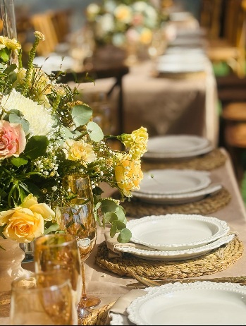 Elegant table setting with roses and fine china
