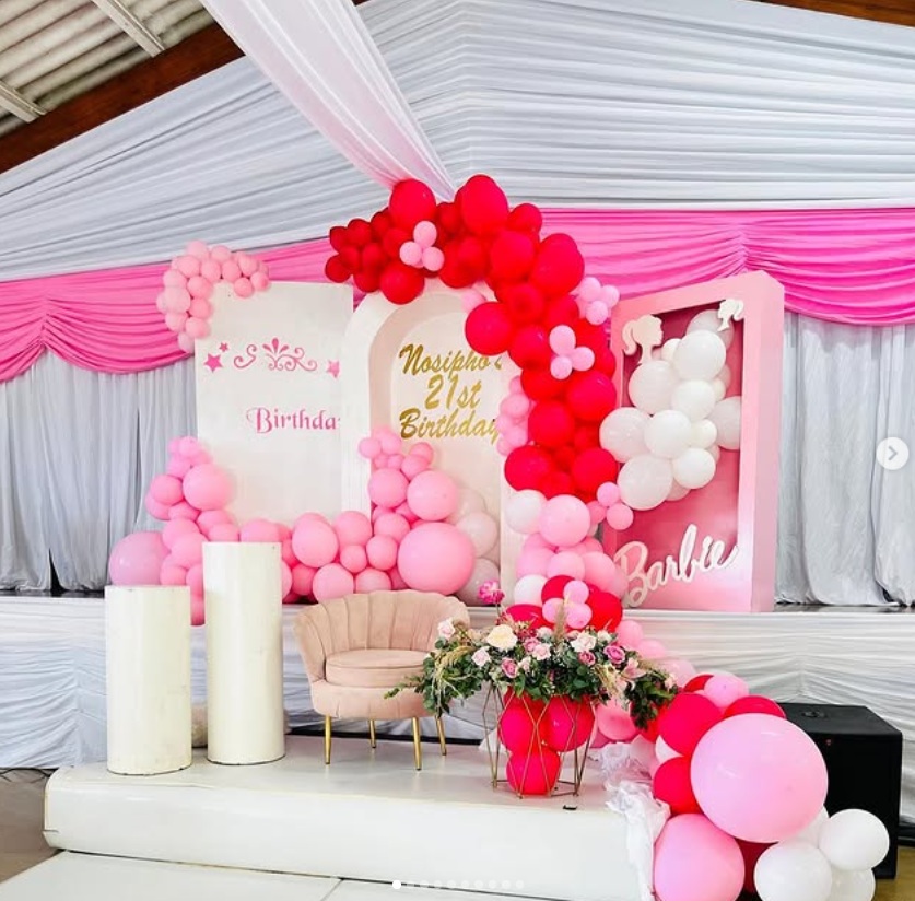 Pink and red balloon birthday backdrop